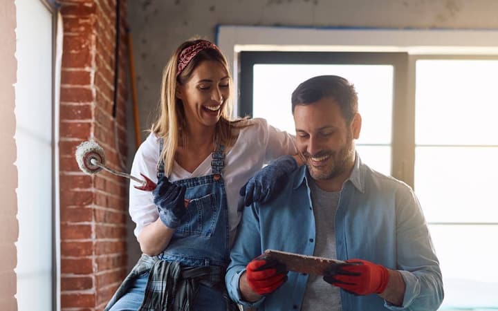 Real estate investor hands-on renovating a rental property