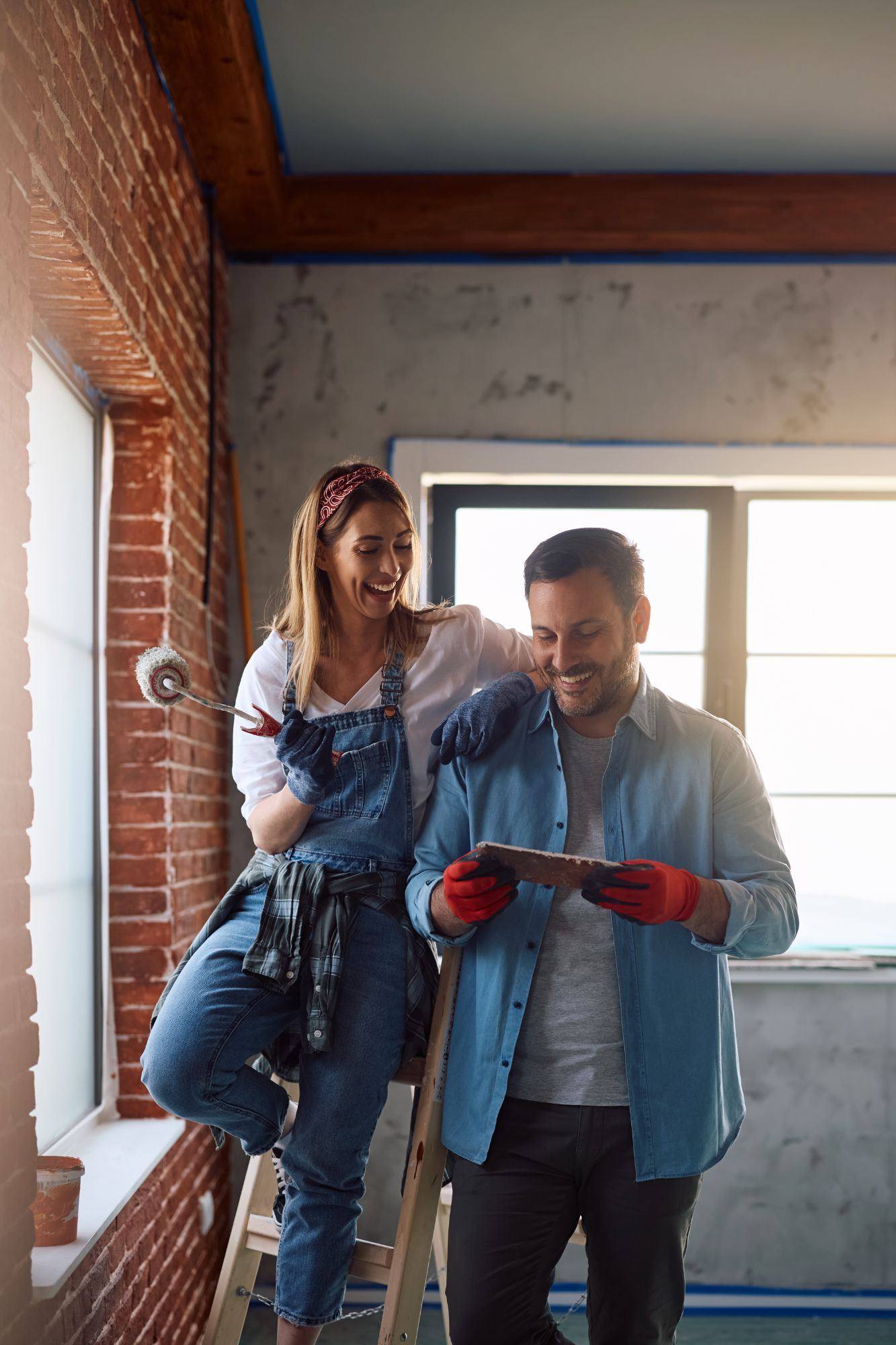Real estate investor hands-on renovating a rental property