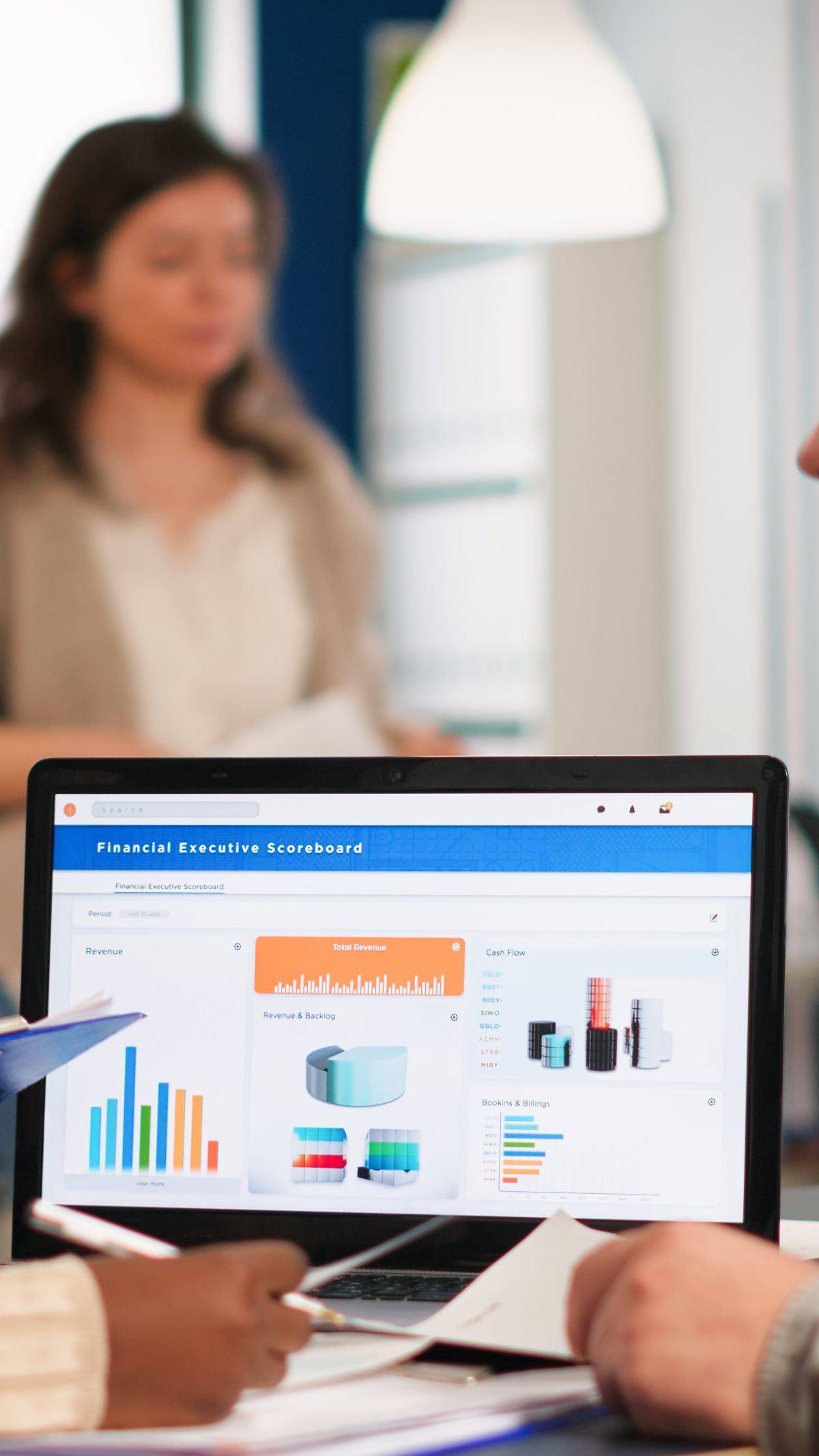 Reviewing a financial dashboard on a laptop during a working session