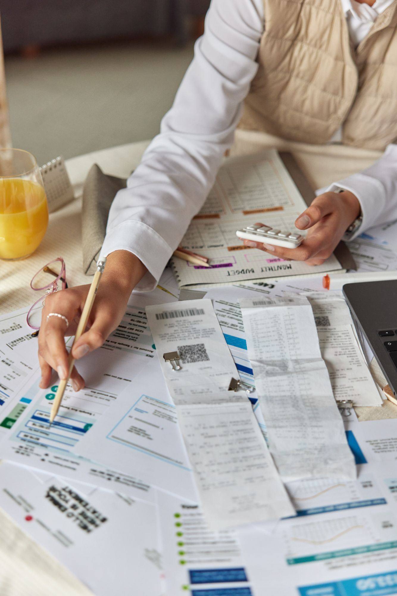 Sorting receipts and tax documents while reviewing a return